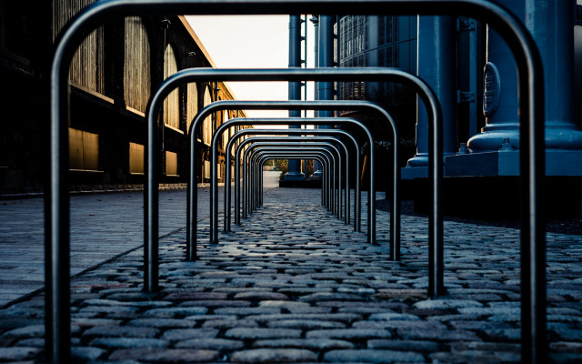 Metal bars cobblestone street clocktower free wallpaper for desktop - medium preview image