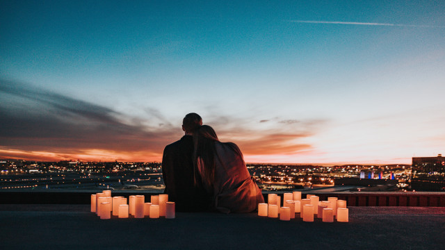 Romantic couple candles sunset cityscape free wallpaper for desktop - medium preview image