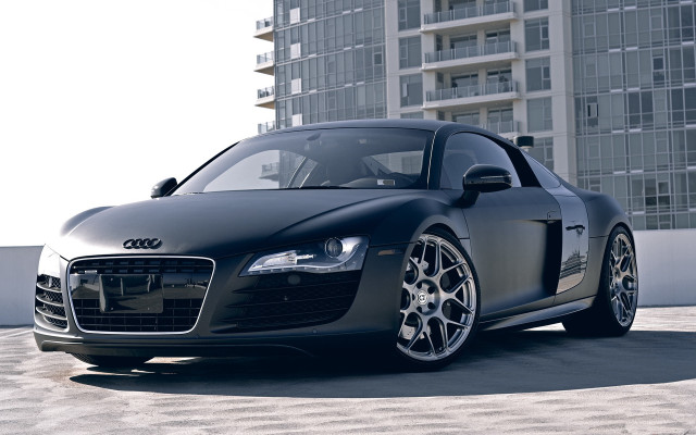 Black car tall building sky free wallpaper for desktop - medium preview image