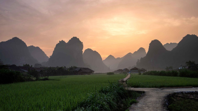 Field path village mountains sunset free wallpaper for desktop - medium preview image