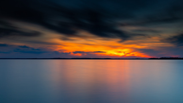 Sunset mountain lake boat mystical free wallpaper for desktop - medium preview image