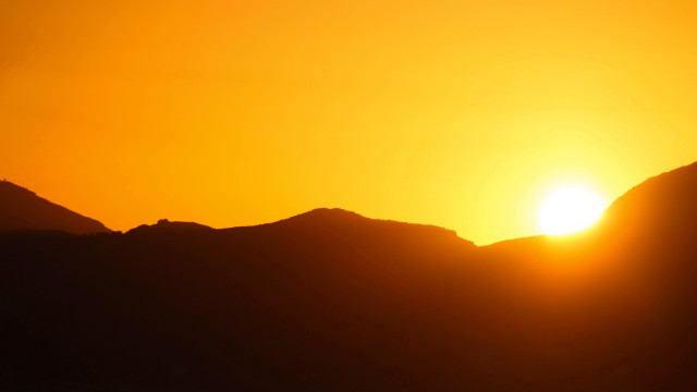 Bird sunset mountains orange sky free wallpaper for desktop - medium preview image