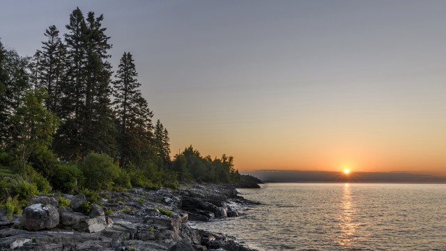 Sunset lake trees rocks water free wallpaper for desktop - medium preview image