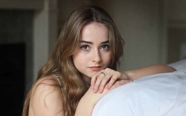 Woman laying bed ring portrait free wallpaper for desktop - medium preview image