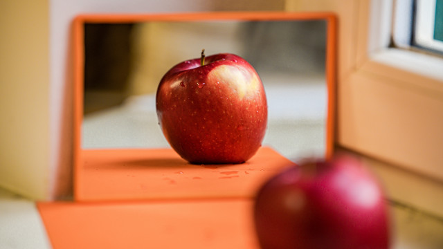 Red apple table mirror reflection free wallpaper for desktop - medium preview image