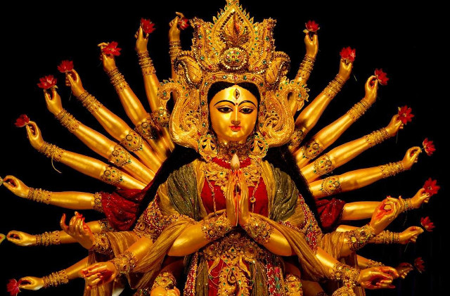 Woman statue many arms outstretched free wallpaper for desktop - medium preview image