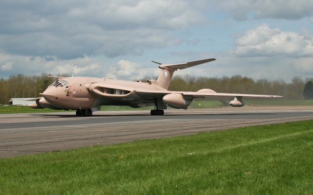 Military plane runway cloudy sky free wallpaper for desktop - medium preview image