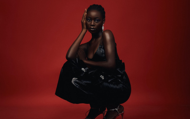 Afrofuturism red background brown skin free wallpaper for desktop - medium preview image