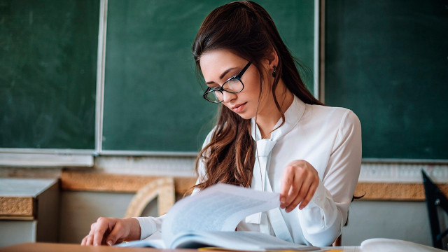 Woman glasses reading classroom chalkboard free wallpaper for desktop - medium preview image