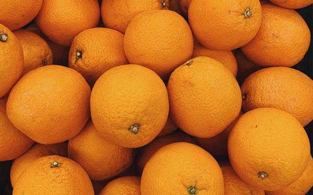 Oranges pile table black background free wallpaper for desktop - medium preview image