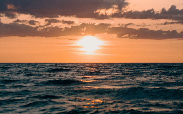Sunset ocean boat clouds horizon #2 free wallpaper for desktop - medium preview image
