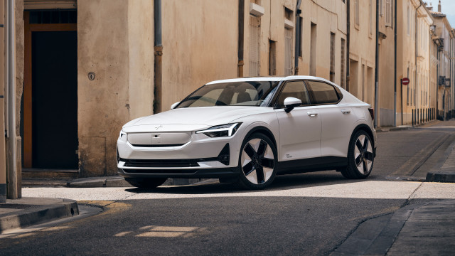 White car street building sidewalk free wallpaper for desktop - medium preview image