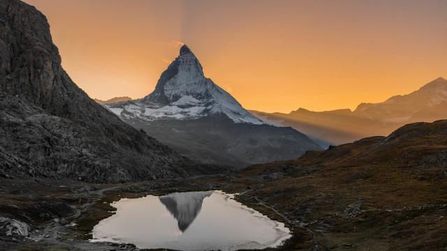 Mountain lake reflection cloudy sunset free wallpaper for desktop - medium preview image