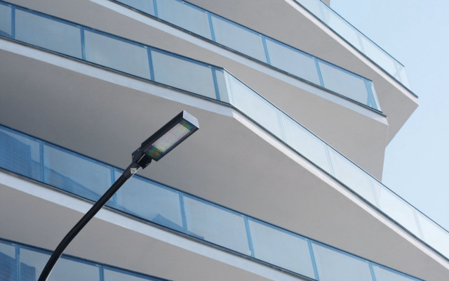 Streetlight building windows blue sky free wallpaper for desktop - medium preview image