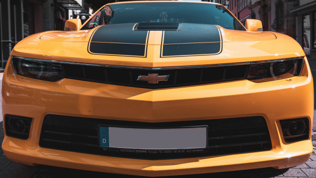 Yellow sports car black stripe #2 free wallpaper for desktop - medium preview image