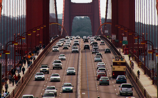 Large bridge traffic tower cityscape free wallpaper for desktop - medium preview image