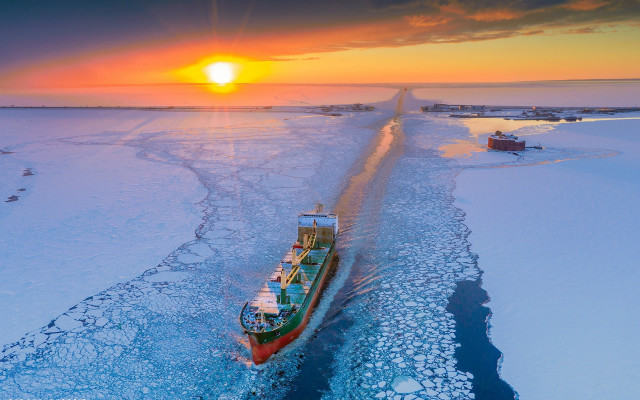 Frozen lake boat sunset mountains free wallpaper for desktop - medium preview image