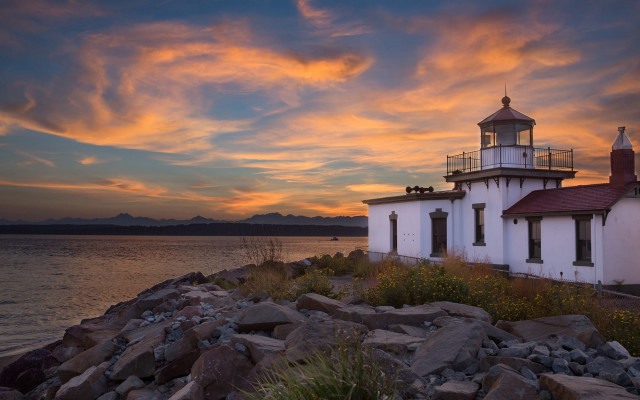 Lighthouse rocky shore sunset clouds #2 free wallpaper for desktop - medium preview image