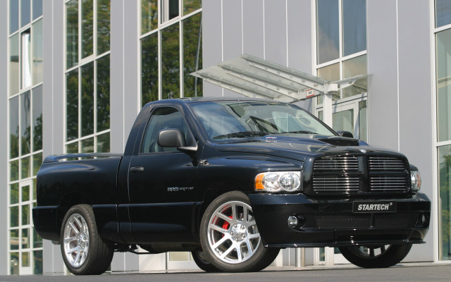 Black truck building large window free wallpaper for desktop - medium preview image