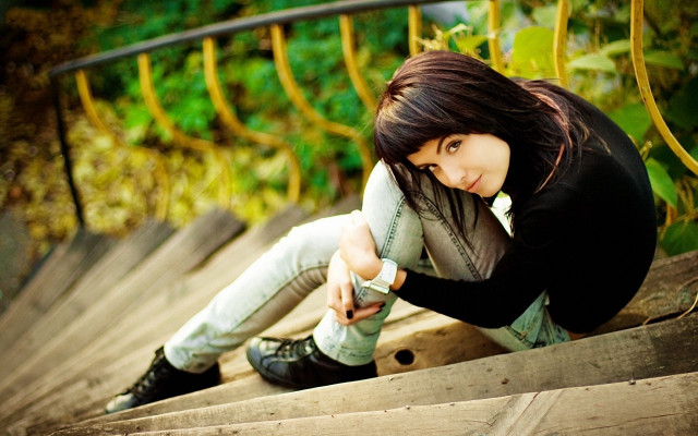 Woman sitting stairs phone portrait free wallpaper for desktop - medium preview image