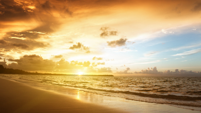 Sunset ocean clouds beach person free wallpaper for desktop - medium preview image