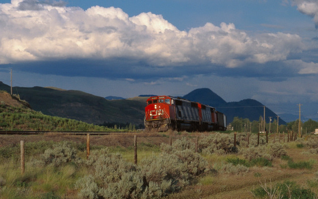 Train rural countryside mountains cloudy free wallpaper for desktop - medium preview image