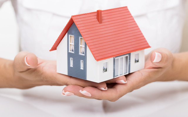 Woman holding model house red free wallpaper for desktop - medium preview image