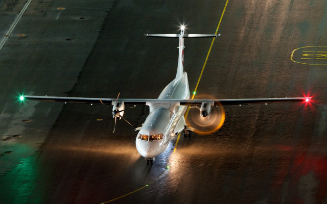 Jetliner foggy night lighting tiltshift free wallpaper for desktop - medium preview image