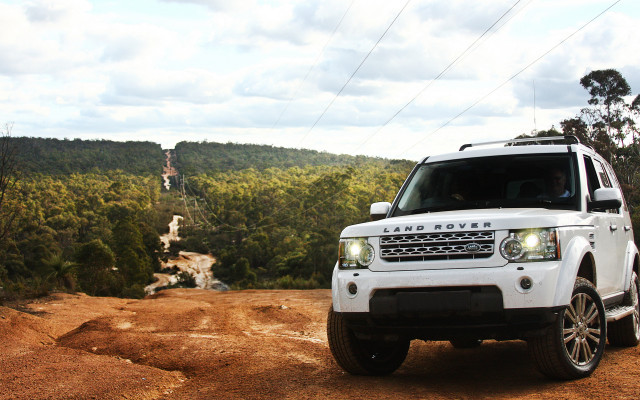 White landrover dirtroad forest hill free wallpaper for desktop - medium preview image