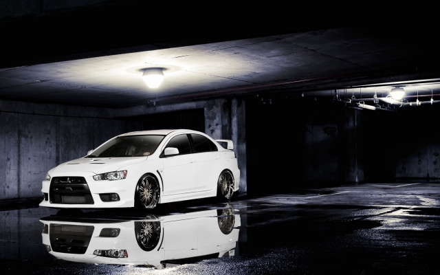 White car parking garage reflective free wallpaper for desktop - medium preview image