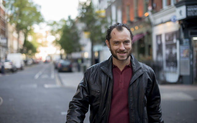 Man smiling leather jacket city free wallpaper for desktop - medium preview image