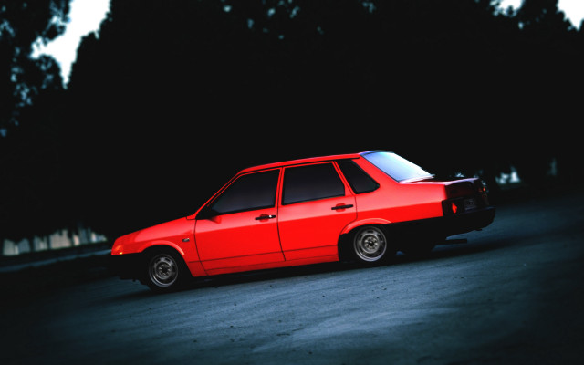 Red car night road trees free wallpaper for desktop - medium preview image