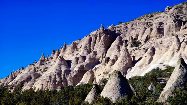 Mountain rocks trees landscape blue free wallpaper for desktop - medium preview image