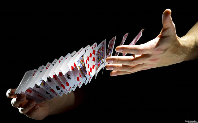 Hand holding playing cards black free wallpaper for desktop - medium preview image