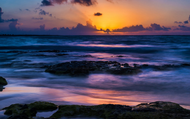 Sunset ocean rocks clouds mountain free wallpaper for desktop - medium preview image