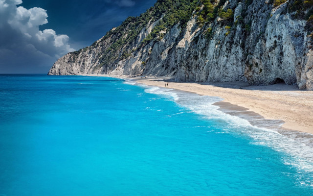 Exekias beach cliff blue water free wallpaper for desktop - medium preview image