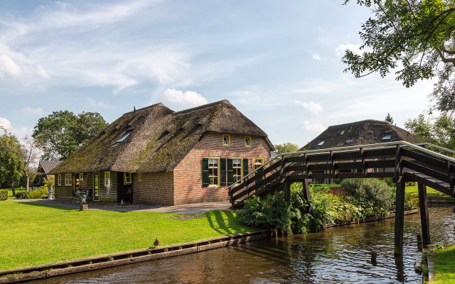 Thatched roof house river bridge free wallpaper for desktop - medium preview image