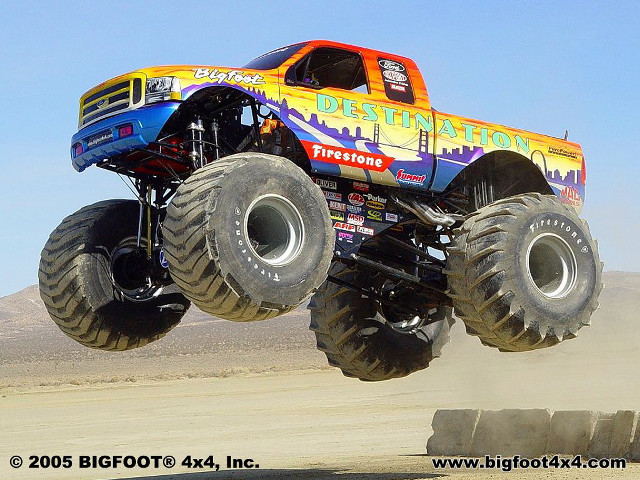 Monster truck air tire pile free wallpaper for desktop - medium preview image