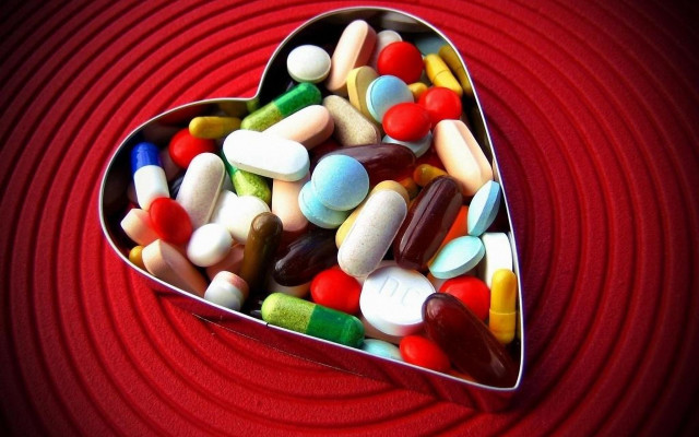 Heart tin pills red background #2 free wallpaper for desktop - medium preview image