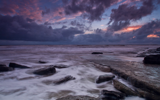 Rocky beach cloudy sky dusk free wallpaper for desktop - medium preview image