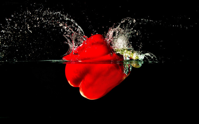 Red pepper splashing water macro free wallpaper for desktop - medium preview image