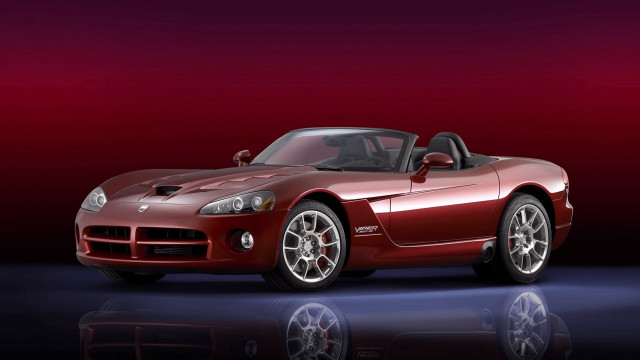 Red sports car studio reflection free wallpaper for desktop - medium preview image
