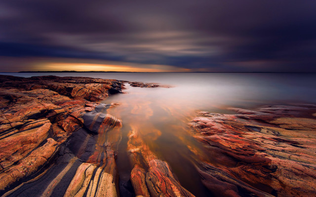 Rocky shore dusk mountain fire free wallpaper for desktop - medium preview image