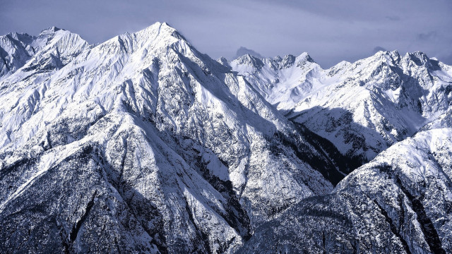 Mountain range snowy cloudy sky free wallpaper for desktop - medium preview image