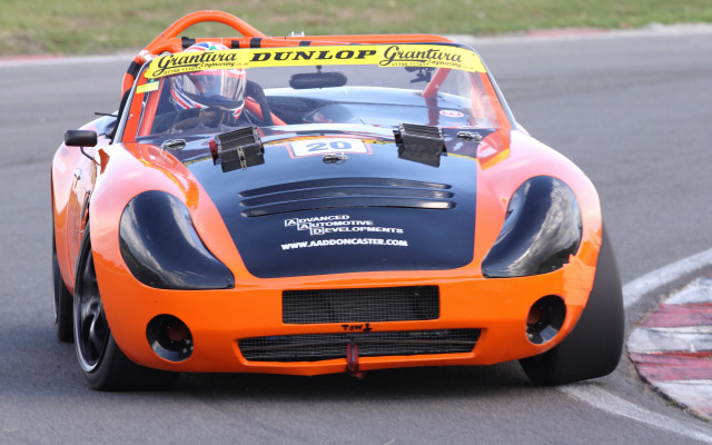 Orange racecar frontview racetrack numbered free wallpaper for desktop - medium preview image