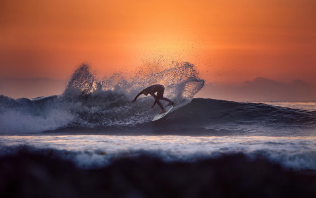 Surfer wave ocean sunset water free wallpaper for desktop - medium preview image