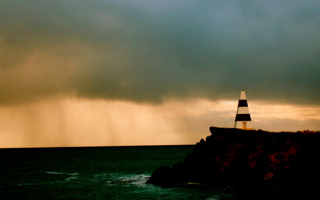 Lighthouse cliff stormy sky lightning free wallpaper for desktop - medium preview image