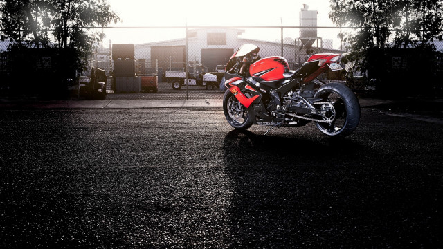 Red motorcycle parking lot fence #3 free wallpaper for desktop - medium preview image