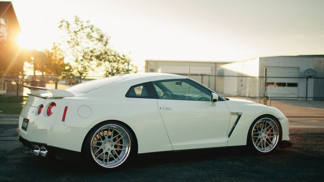 White sports car parked sunshine free wallpaper for desktop - medium preview image