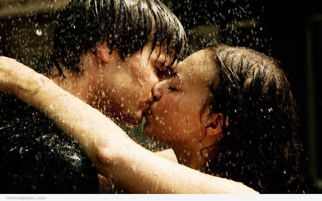 Couple kissing rain arms around free wallpaper for desktop - medium preview image